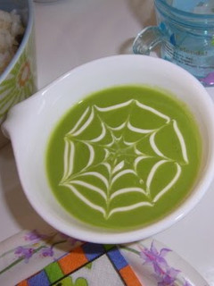 A picture of Halloween Spider Web Green Pea Soup.
