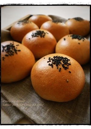 A picture of Black Sesame Anpan Flavoured with Brown Sugar (Bread Rolls Filled with Beans Paste).