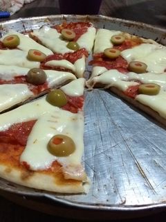 Una foto de Pizza a la parrilla❣️