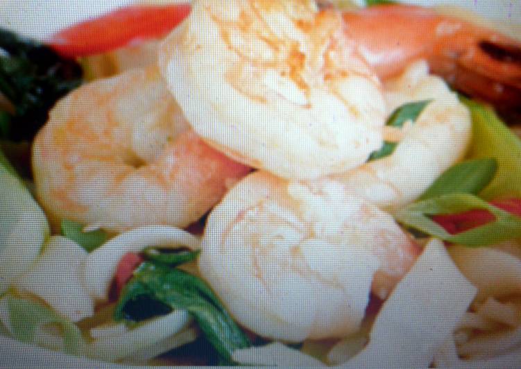 Steps to Make Ultimate Garlic King Prawns with pak choy and fresh noodles