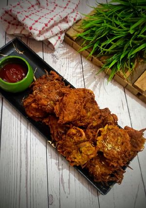 लौकी प्याज़ पकौड़ा (Lauki Pyaz pakoda recipe in hindi) रेसिपी मुख्य फोटो
