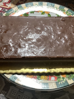 Una foto de Turrón de chocolate almendras y nueces