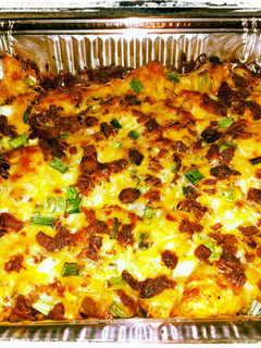 A picture of loaded baked potato an buffalo chicken casserole.