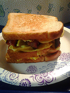 A picture of Folded egg and bacon sandwich.