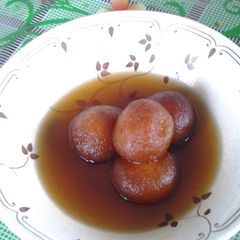 A picture of Gulab Jamun (very popular Indian dessert).