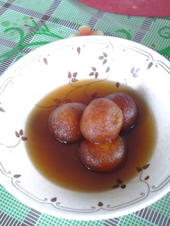 A picture of Gulab Jamun (very popular Indian dessert).