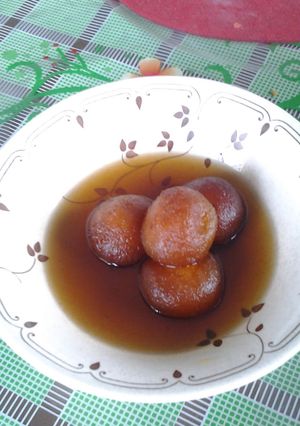 A picture of Gulab Jamun (very popular Indian dessert).