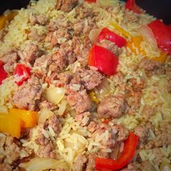 A picture of Italian Sausage And Peppers With Rice.