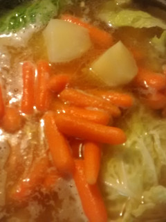 A picture of TL's Traditional Corned Beef and Cabbage.