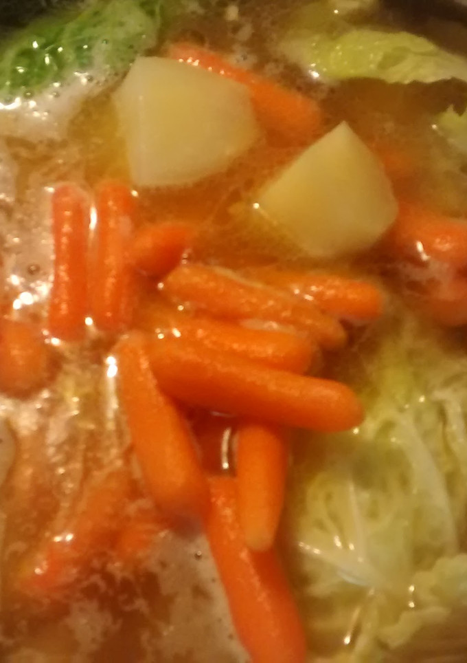 A picture of TL's Traditional Corned Beef and Cabbage.