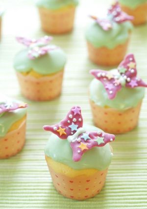 A picture of Spring Coloured Butterfly Cheese Cupcakes.