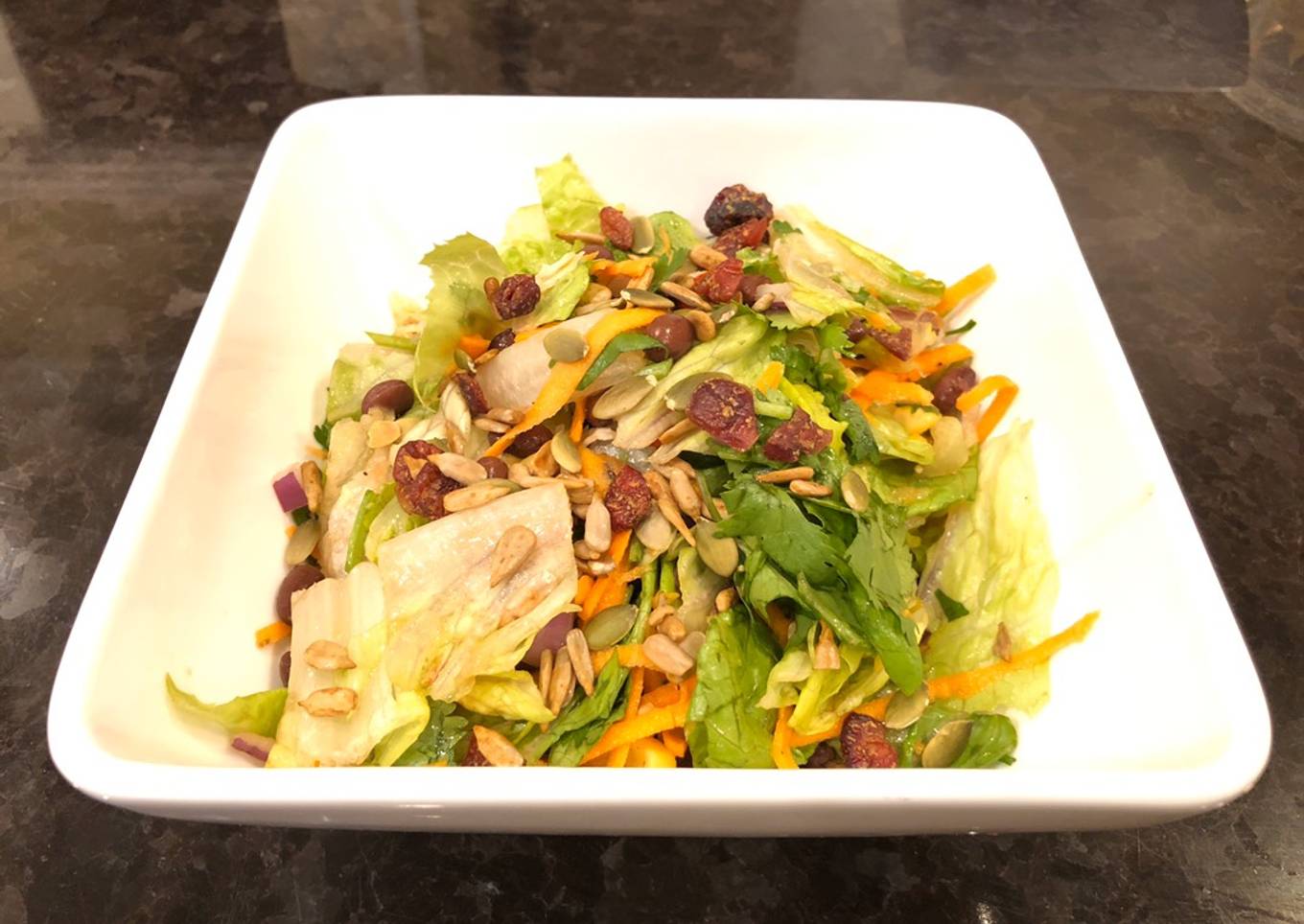 Healthy salad with homemade salad dressing