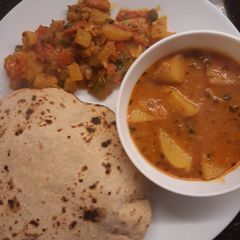 A picture of Jowar ki roti with Dahi ke aloo.