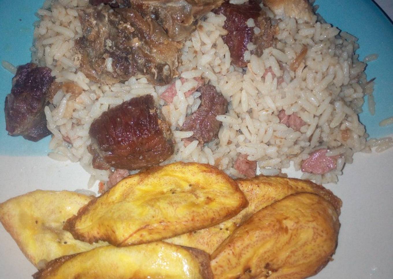 Coconut rice,assorted beef and chicken with plantain