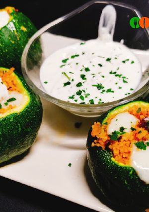 Una foto de Calabacín luna relleno de cuscús con calabaza