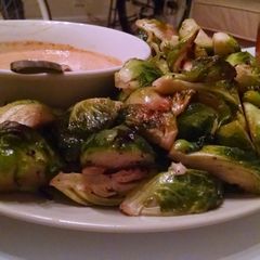 A picture of Roasted Brussel Sprouts with Dressing.