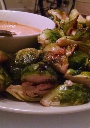 A picture of Roasted Brussel Sprouts with Dressing.