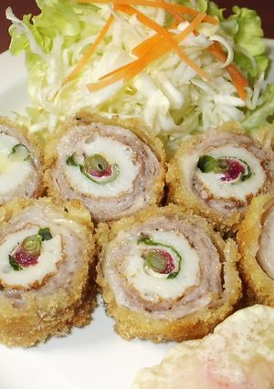 A picture of Rolled Chikuwa Fish Stick and Pork Cutlets with Plum, Shiso, and Cheese.