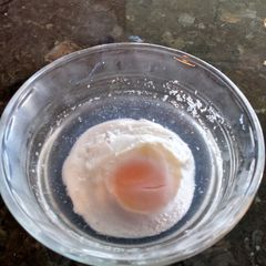 A picture of Soft boiled egg, cooked in microwave.