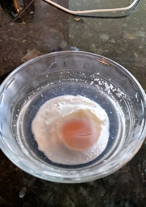 A picture of Soft boiled egg, cooked in microwave.