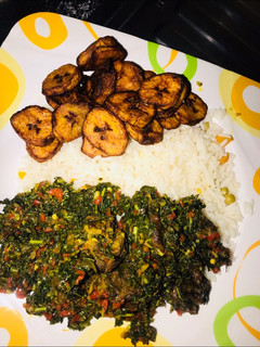 A picture of White rice and spinach sauce.