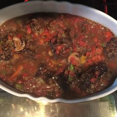 A picture of Hamburger Steaks With Onion And Mushroom Gravy.