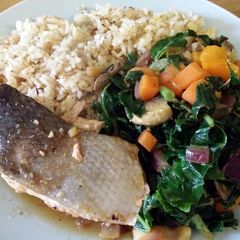 A picture of Baked teriyaki salmon with stir fried vegetables and fried rice.
