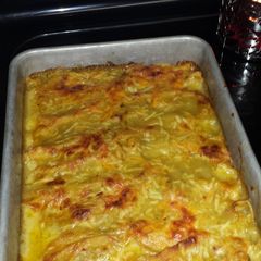 A picture of Chicken enchiladas that make your mouth sing I'm so happy !.