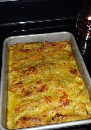 A picture of Chicken enchiladas that make your mouth sing I'm so happy !.