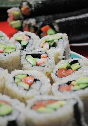 A picture of California Rolls and Seattle Rolls.