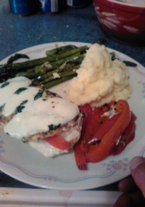 A picture of Red pepper stuffed chicken.