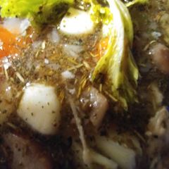 A picture of Big Poppa's 1869 slow cooked chicken broth.
