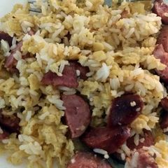 A picture of Fried Egg and sausage rice.