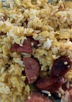 A picture of Fried Egg and sausage rice.