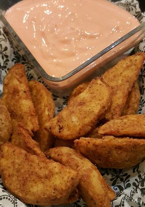 A picture of Potato Wedges.