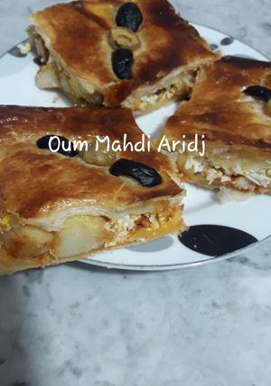 صورة لوصفة فطيرة العجينة المورقة بحشو الشاورما