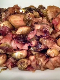 A picture of Roasted Brussel Sprouts with Bacon and Apples.
