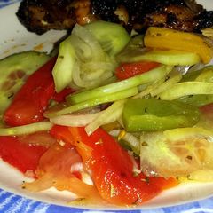 A picture of Grilled Pepper and Tomato Salad.