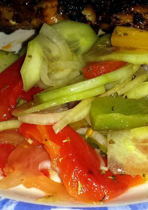 A picture of Grilled Pepper and Tomato Salad.