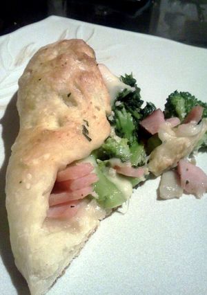 A picture of Ham, Cheese and Broccoli Calzone.