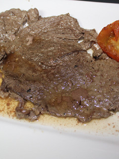 Una foto de Filete de ternera con tomate