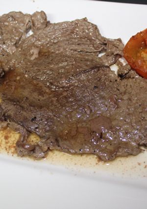 Una foto de Filete de ternera con tomate