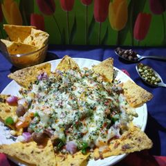 A picture of Nachos Pizza.