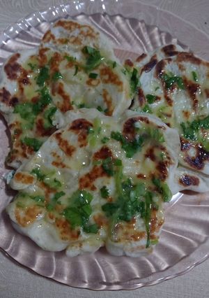 Foto de Naan (Pão Indiano) com manteiga de coentros