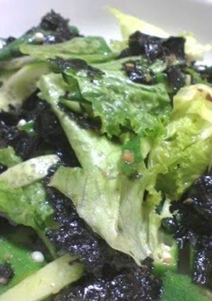 A picture of Tossed Salad with Lots of Korean Nori Seaweed.