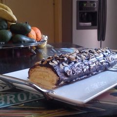 A picture of Swiss roll with lemon curd.