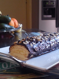 A picture of Swiss roll with lemon curd.