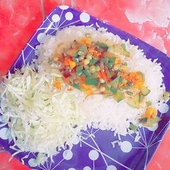 A picture of White Rice with veg source.