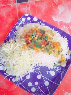 A picture of White Rice with veg source.