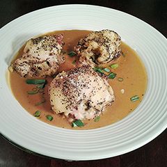 A picture of Boneless Chicken Legs Stuffed with Rice.